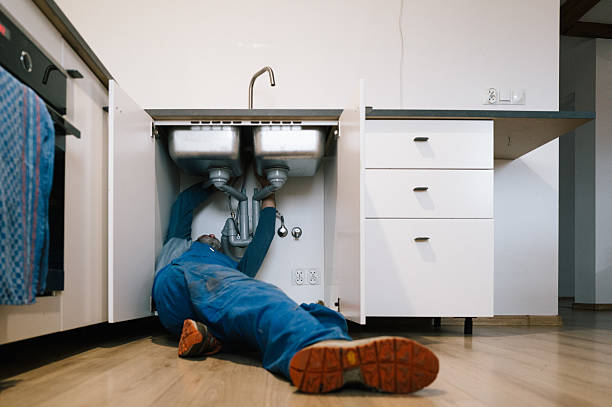 Professional Drain Cleaning technician working in Powell, WY